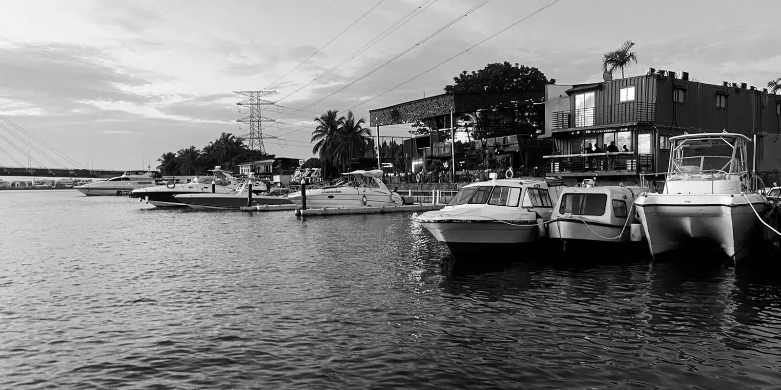 Motorboats and a catamaran moored at a boat club in Lekki, Lagos